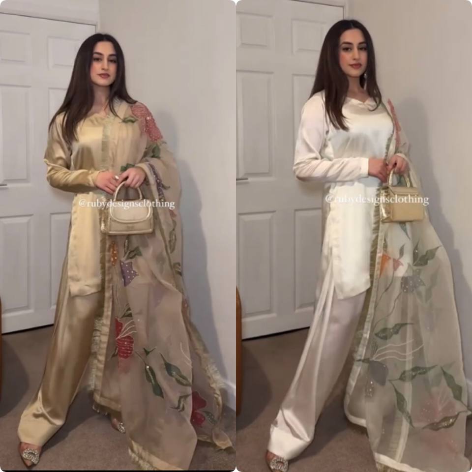 "Grace in Gold & Ivory: Floral Elegance in Traditional Attire"