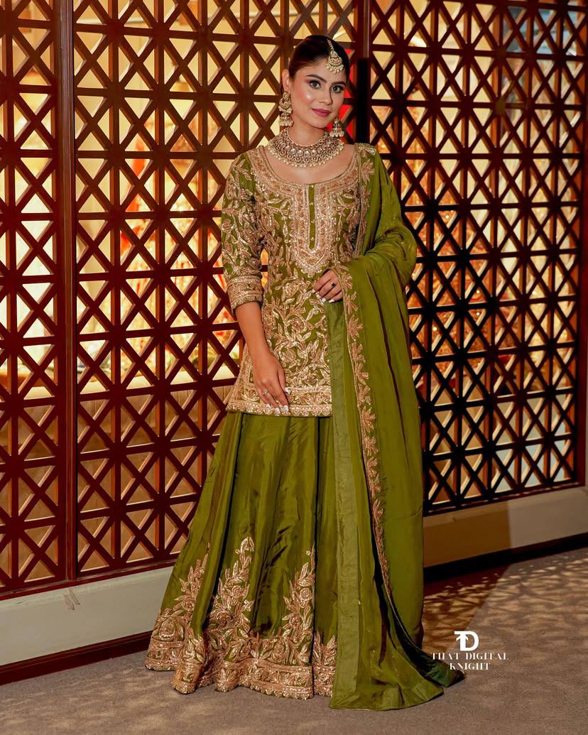 An elegant olive green set with similar embroidery and design as the first.