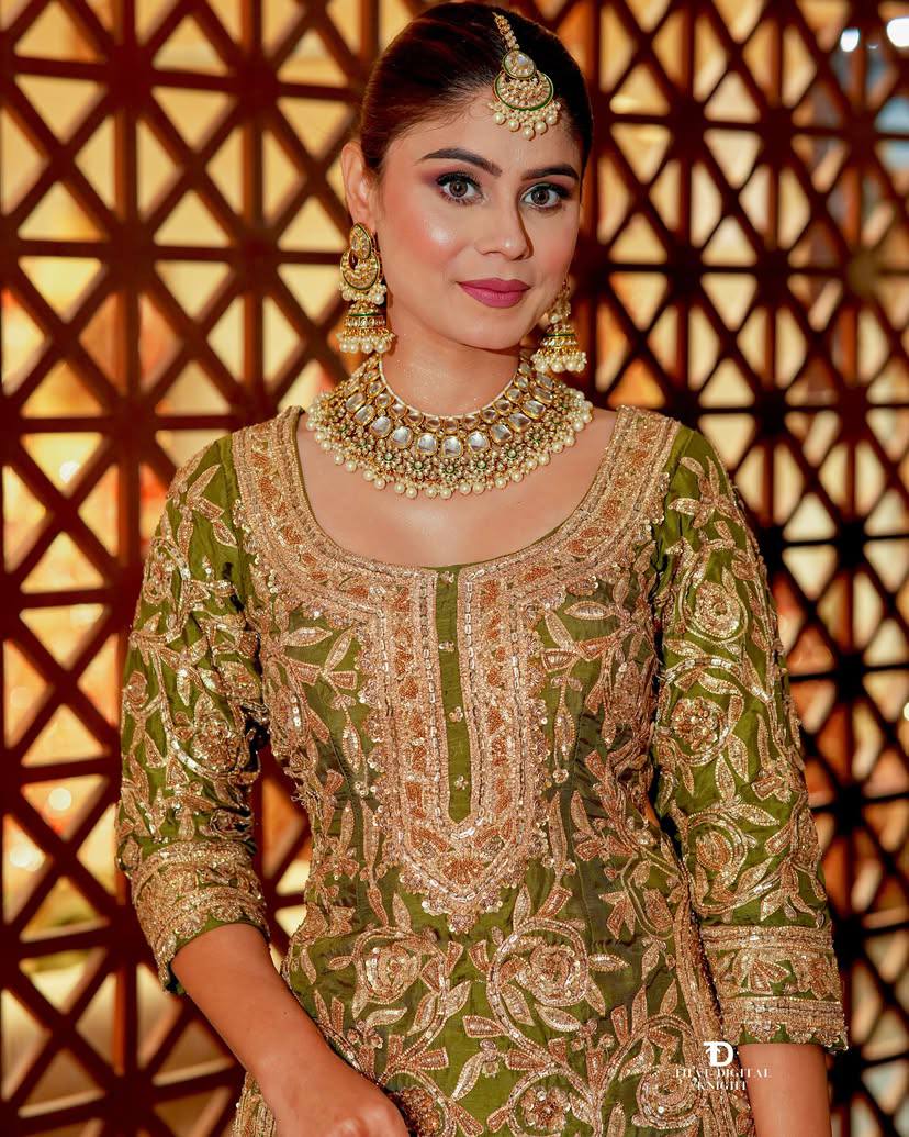 An elegant olive green set with similar embroidery and design as the first.