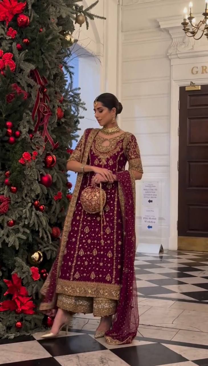 Royal Plum Elegance: Festive Look with Heavy Embroidery and Luxe Traditional Accessories