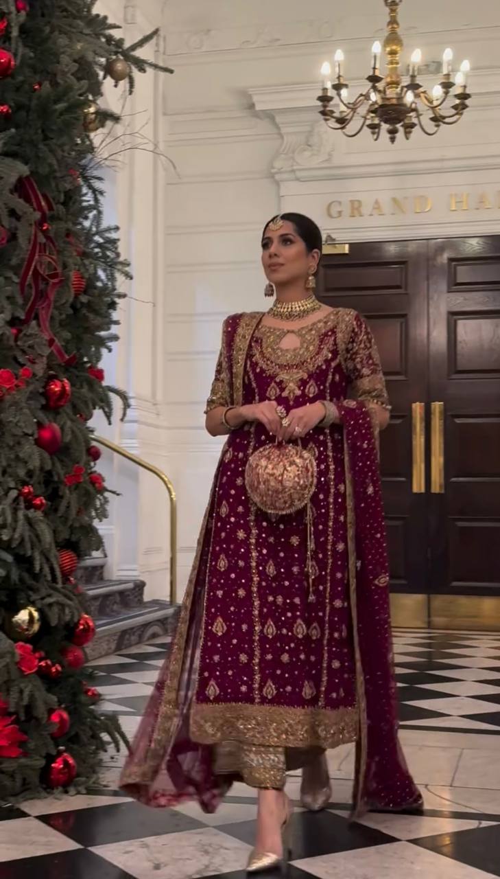 Royal Plum Elegance: Festive Look with Heavy Embroidery and Luxe Traditional Accessories