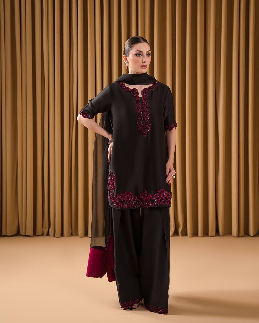 Elegant Black Three-Piece Suit with Deep Pink Embroidered Detailing for Festive or Formal Occasions        4o