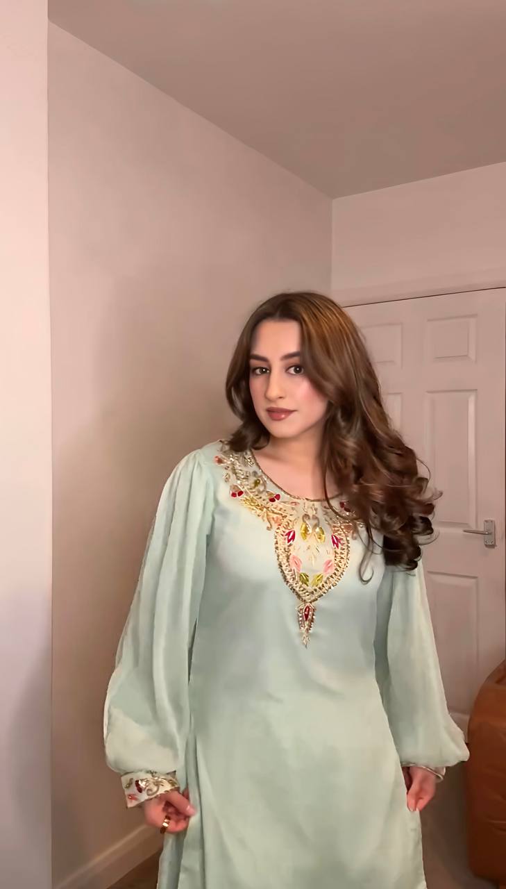 "Graceful Glamour: Timeless Ethnic Elegance in Pastel and Black Hues"