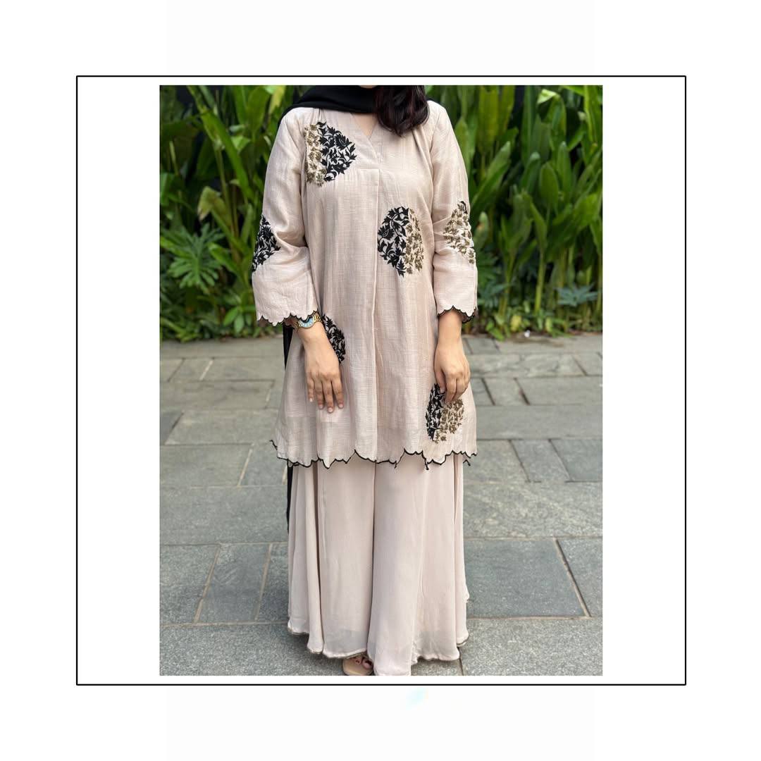 Luxe Style: Black Embroidery on Elegant Beige Kurta