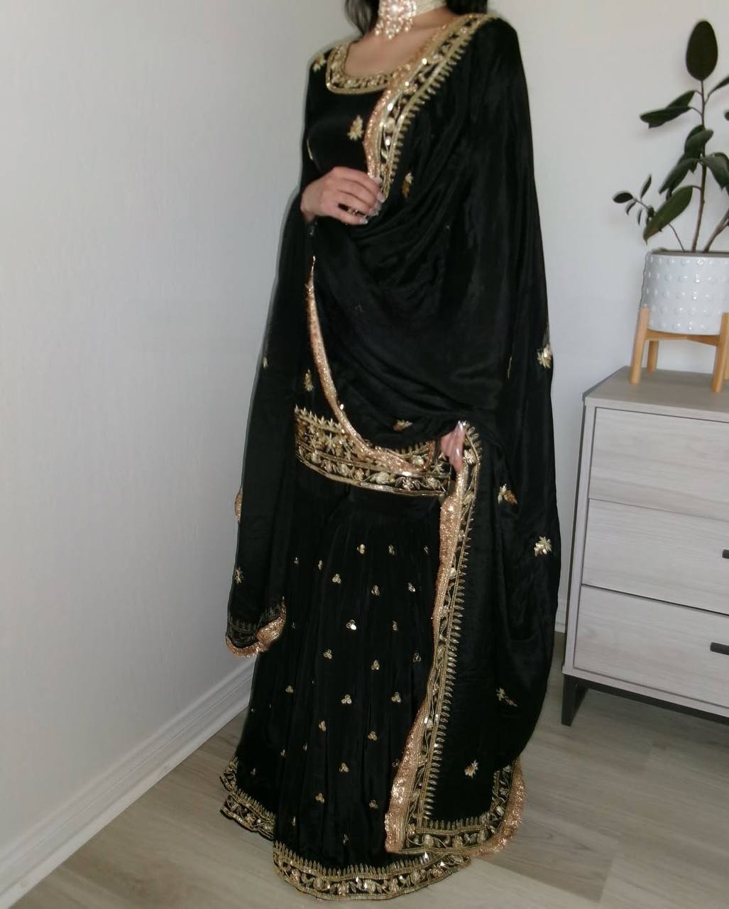 Elegance in Black and Gold: A Captivating Fashion Statement