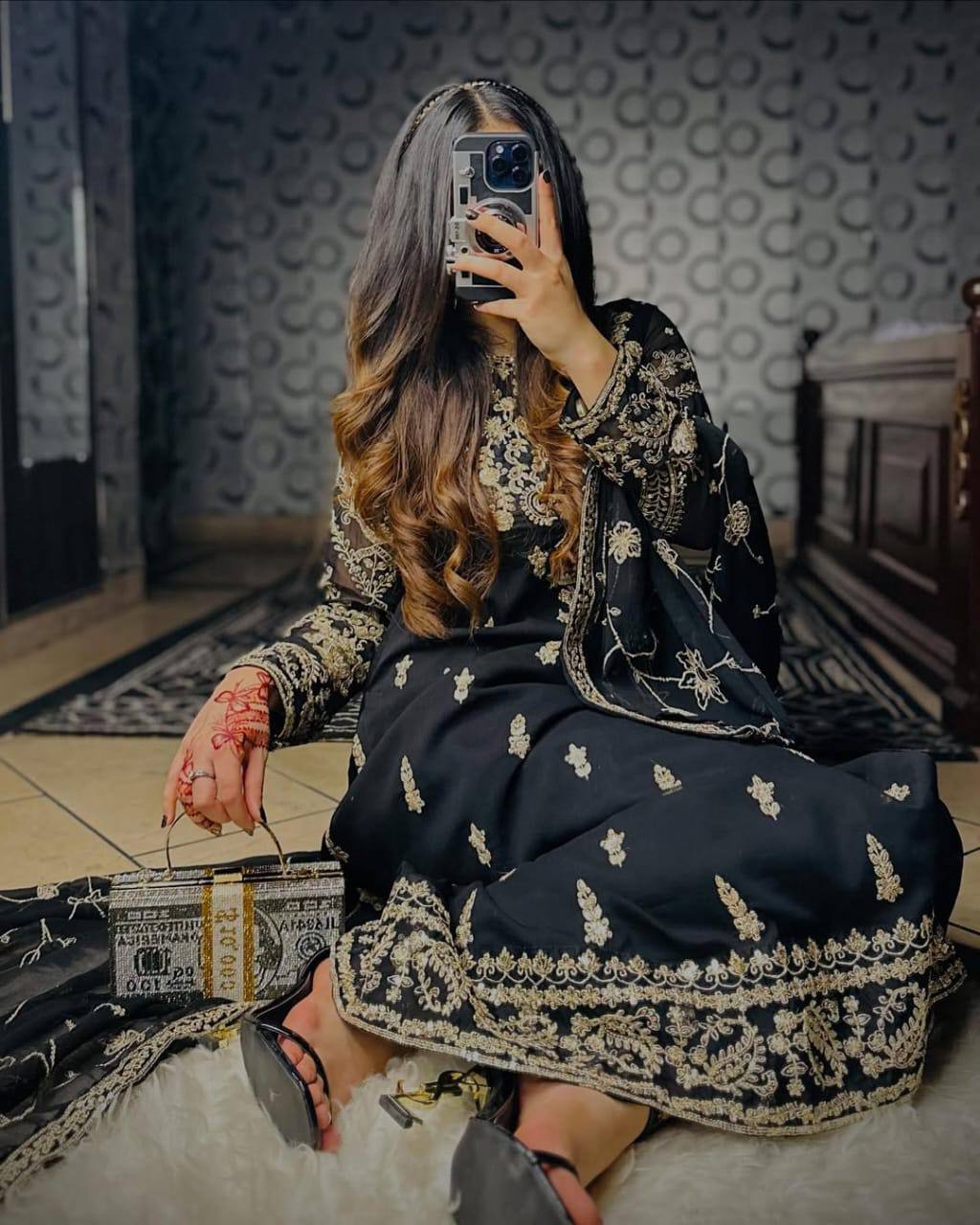 Sophisticated Selfie: A Woman's Poise in Elegant Black Ensemble