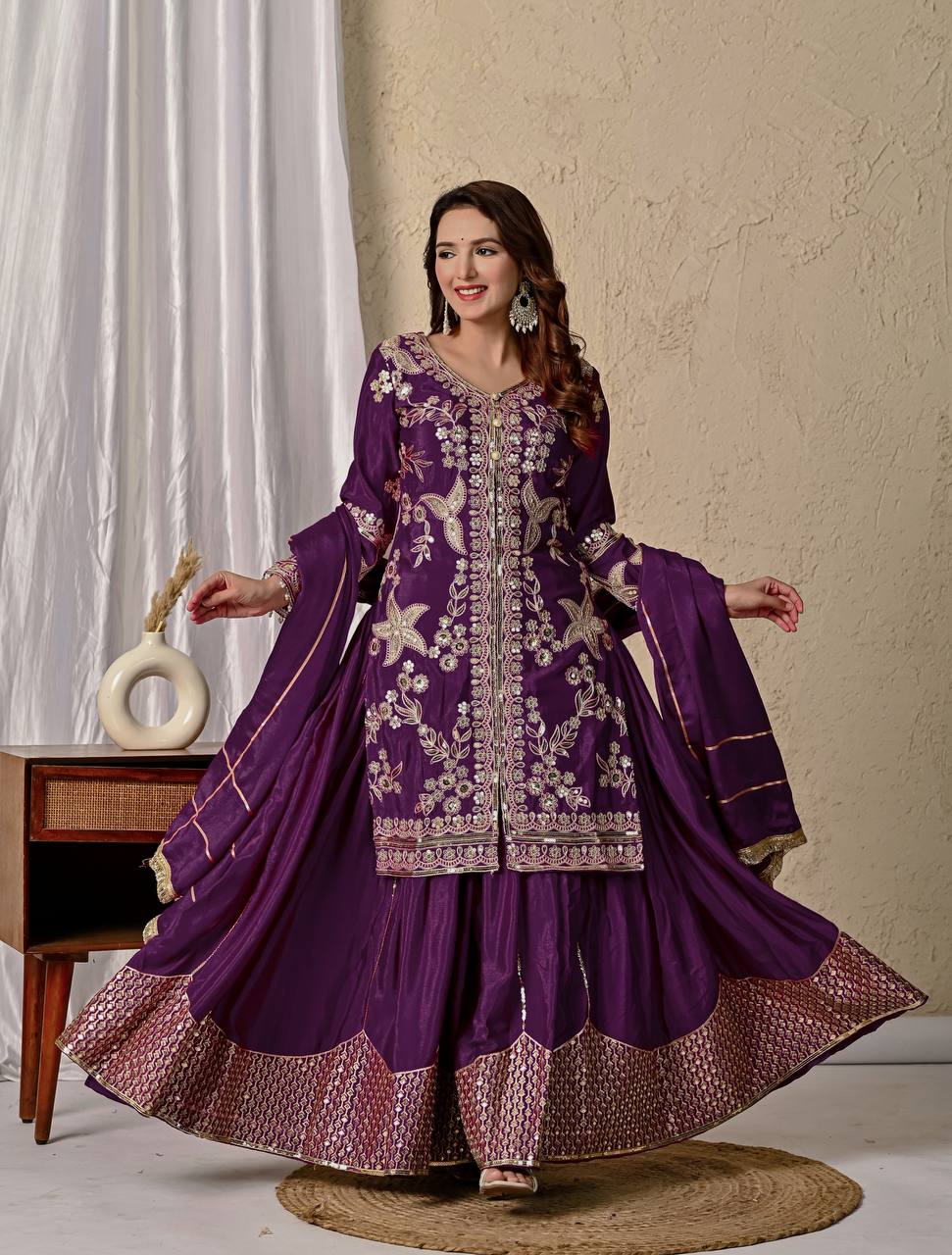 Regal Elegance: Purple Embroidered Georgette Ensemble